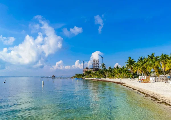 Beautiful Playa Azul beach and seascape panorama with blue turquoise water hotels resorts and palm trees in Cancun Quintana Roo Mexico.