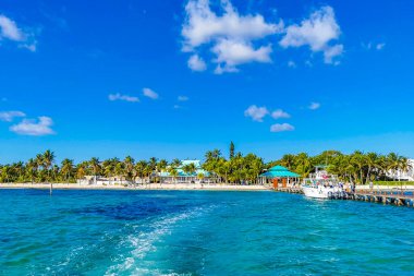 Boat trip tour from Cancun to Island Mujeres Isla Contoy and Whale shark tour with natural tropical seascape panorama and blue turquoise and green clear water view from boat in Quintana Roo Mexico.