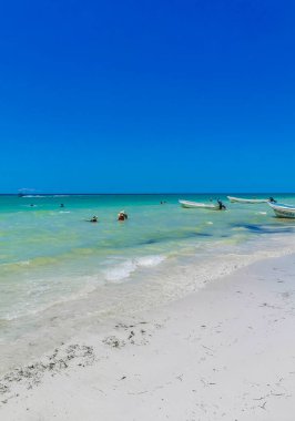 Holbox Mexico 16. May 2022 Panorama landscape view on beautiful Holbox island sandbank and beach with waves turquoise water and blue sky in Quintana Roo Mexico.