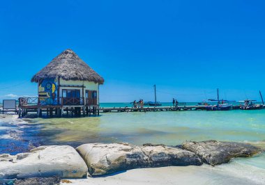 Holbox Mexico 16. May 2022 Panorama landscape view on beautiful Holbox island sandbank and beach with waves turquoise water and blue sky in Quintana Roo Mexico.
