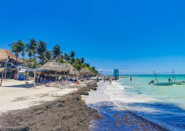 Holbox Mexico 16. May 2022 Panorama landscape view on beautiful Holbox island sandbank and beach with waves turquoise water and blue sky in Quintana Roo Mexico.