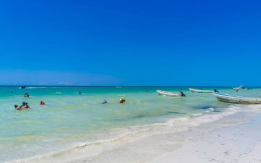 Holbox Mexico 16. May 2022 Panorama landscape view on beautiful Holbox island sandbank and beach with waves turquoise water and blue sky in Quintana Roo Mexico.