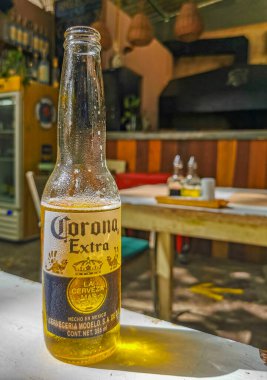 Playa del Carmen Mexico 12. June 2022 Corona beer bottle food and drink in the restaurant PapaCharly Papa Charly in Playa del Carmen Quintana Roo Mexico.