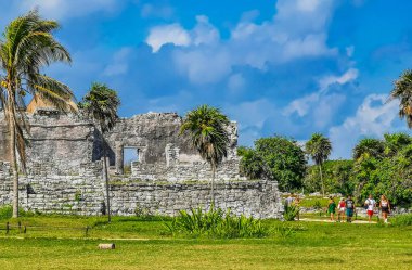 Tulum Mexico 05. August 2022 Ancient Tulum ruins Mayan site with temple ruins pyramids and artifacts in the tropical natural jungle forest palm and seascape panorama view in Tulum Mexico.