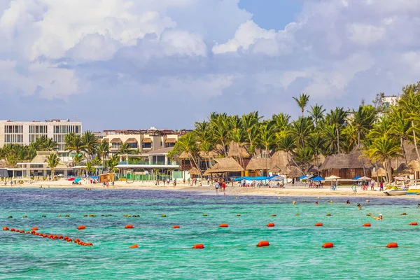 Playa del Carmen 18. August 2021 Tropical mexican beach landscape panorama full of people at beach parties on vacation in Playa del Carmen Mexico.