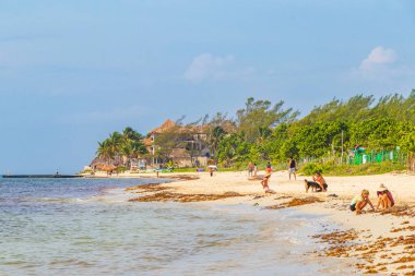 Playa del Carmen 18. August 2021 Tropical mexican beach landscape panorama full of people at beach parties on vacation in Playa del Carmen Mexico.