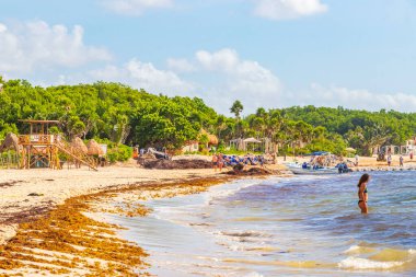 Playa del Carmen 18. August 2021 Tropical mexican beach landscape panorama full of people at beach parties on vacation in Playa del Carmen Mexico.