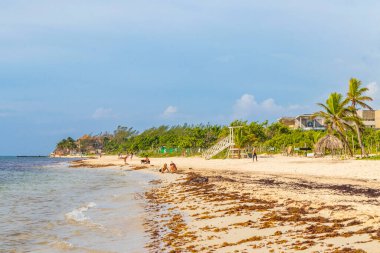 Playa del Carmen 18. August 2021 Tropical mexican beach landscape panorama full of people at beach parties on vacation in Playa del Carmen Mexico.