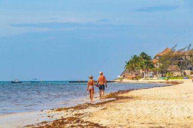 Playa del Carmen 18. August 2021 Tropical mexican beach landscape panorama full of people at beach parties on vacation in Playa del Carmen Mexico.