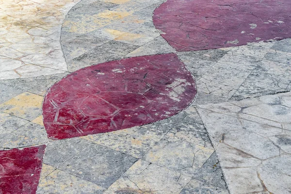 Beautiful red and orange wall stone and floor or ground texture pattern in Playa del Carmen Quintana Roo Mexico.