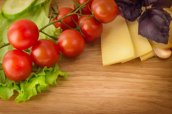Cheese with tomatoes and Basil — Stock Photo, Image