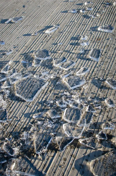 Shards of smashed ice on the floor — Stock Photo, Image