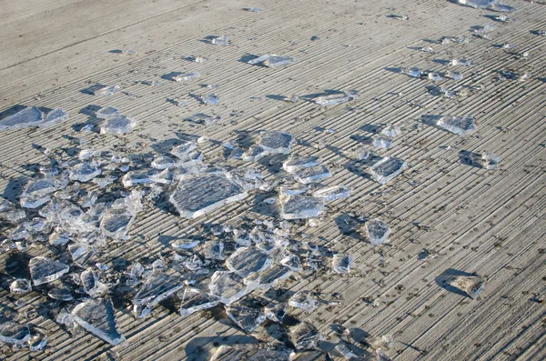 Shards of smashed ice on the floor — Stock Photo, Image