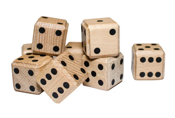 Isolated pile of numerous wooden dice — Stock Photo, Image