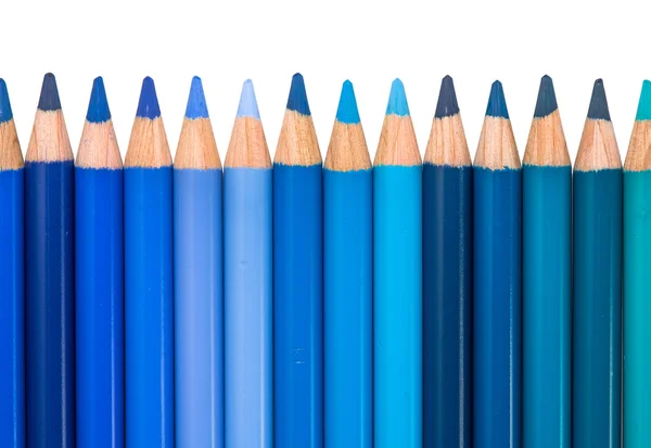 Fila com lápis de cor azul e verde — Fotografia de Stock