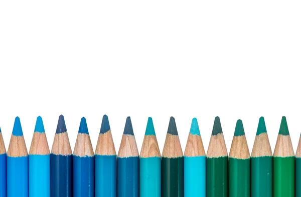 Fila con crayones de color azul y verde —  Fotos de Stock