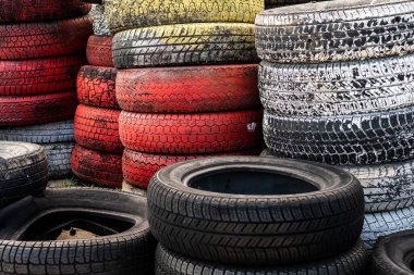 Pile Of Old Used Car And Bike Tyres Representing Hazardous Waste And Material For Recycling Rubber 