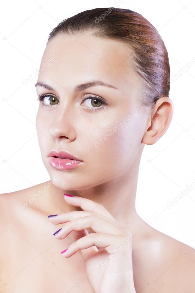 Brunette woman with natural make up with highlights isolated