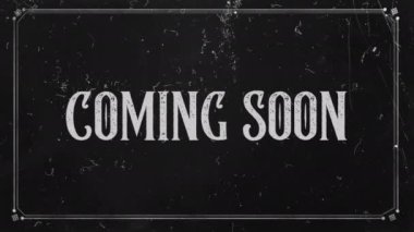 Retro Outro. Vintage pop-up text screen saver with text: Coming Soon. A re-created film frame from the silent movies era, showing an intertitle text - Coming Soon. Outro.