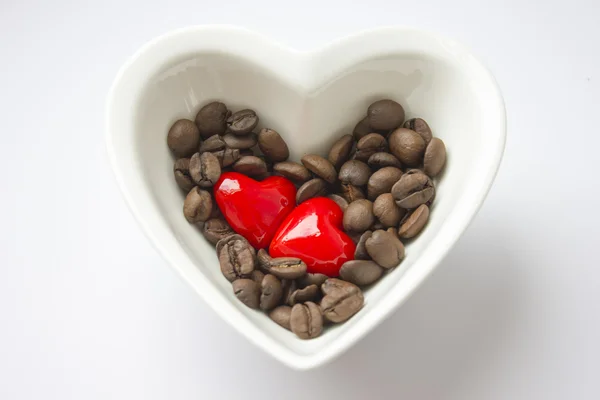 Coffee - hearts, grains, bowl — Stock Photo, Image