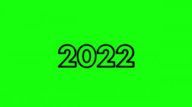2022 numara, mutlu yıllar. Yeşil arka planda parlayan siyah harfler görünüyor. Yeşil Ekran