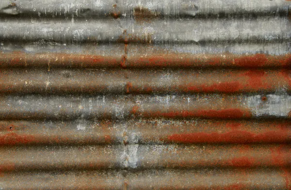 Paslı kıvrımlı metal arka plan