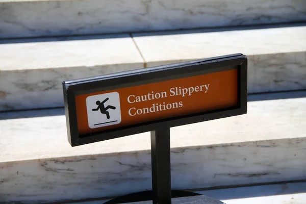 Caution Slippery Conditions Brown Sign Icon Representation Marble Steps Black — Stock Photo, Image