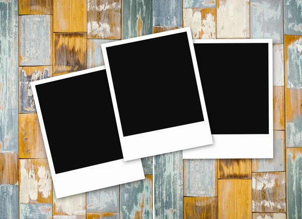Photo frame on wood table — Stock Photo, Image