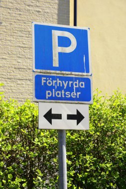 Parking sign, allowing left/right of parking sign