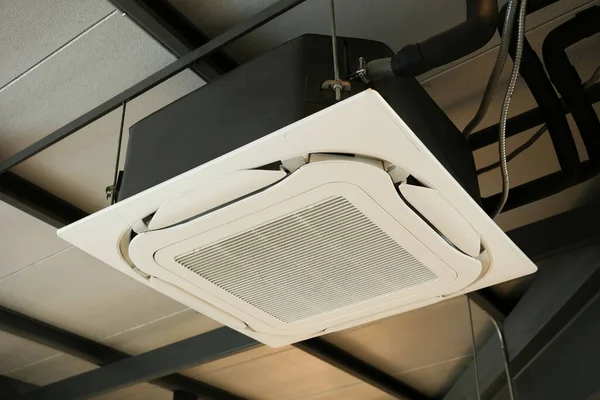 Close up air conditioning central system installed on the ceiling