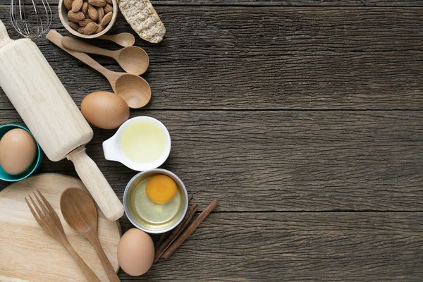 Food, dessert or bakery ingredients , kitchen utensils for cooking on wooden background