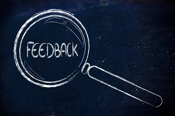 Finding feedback, magnifying glass focusing on feedback — Stock Photo, Image