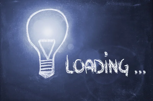 Idea loading, lightbulb on blackboard — Stock Photo, Image