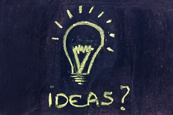 Brainstorming, funny lightbulb on blackboard — Stock Photo, Image