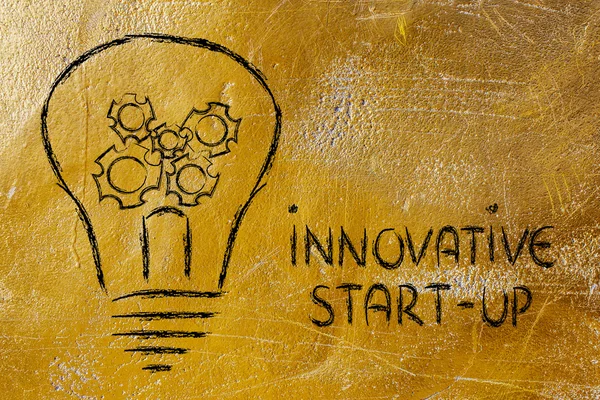 Innovative start-up, lightbulb with gearwheels — Stock Photo, Image