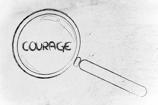 Magnifying glass focusing on courage — Stock Photo, Image