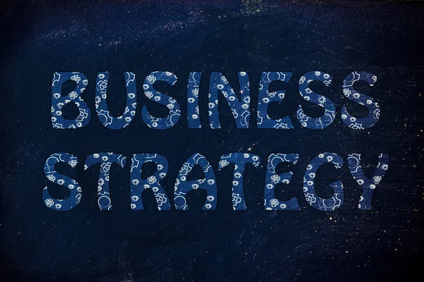 Estrategia de negocio escribiendo con brillante patrón de ruedas dentadas —  Fotos de Stock