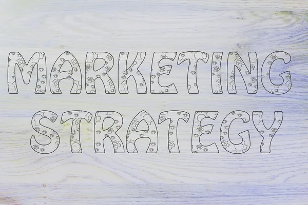 Estratégia de marketing escrita com padrão de engrenagens brilhantes — Fotografia de Stock