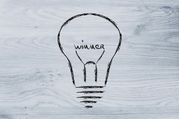 Lightbulb with filament saying Winner — Stock Photo, Image