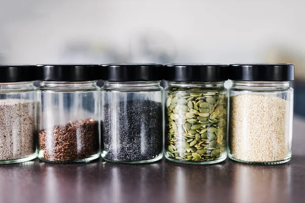 Seeds Including Pumpkin Chia Sesame Flax Matching Spice Jars Kitchen — Stock Photo, Image