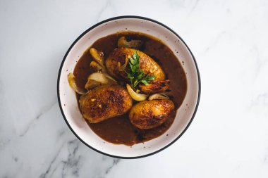 vegan roasted potatoes and onion with gravy, healthy plant-based food recipes