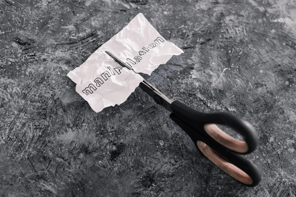 Manipulation Text Crumpled Piece Paper Which Getting Cut Scissors Concept — Stock Photo, Image