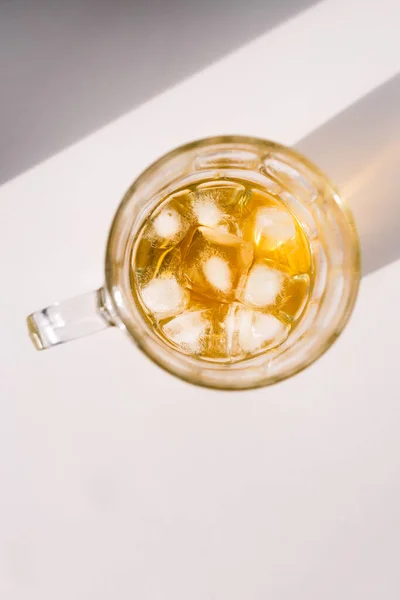 Golden Brown Amber Liquor Stein Glass Ice White Background Harsh — Stockfoto