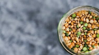 spice jar with lentil and bean soup mix close-up shot of pantry ingredients, concept of simple toppings to flavour your dishes