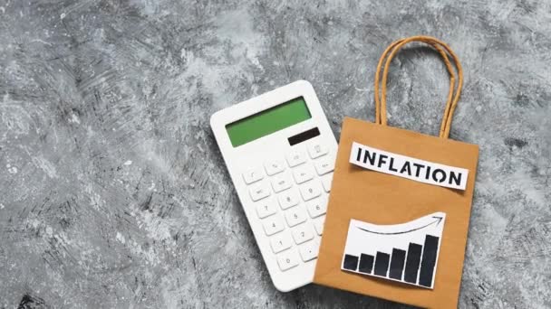 Інфляція Приголомшливе Економічне Концептуальне Зображення Текстом Над Торговою Сумкою Графіками — стокове відео