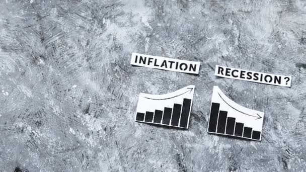 通货膨胀和经济衰退 概念形象 文字和图表显示价格上涨和增长下降 — 图库视频影像