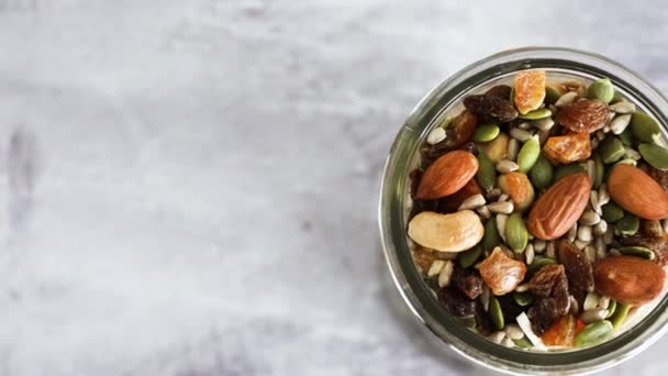 Glass Jar Mixed Nuts Including Almonds Cashews Pistachios Concept Natural — Stock Video