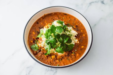 plant-based lentil and beans curry with coconut jasmine rice and coriander, healthy vegan food recipes