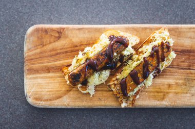 plant-based reuben sandwich with sauerkraut and vegan sausage, healthy vegan food recipes