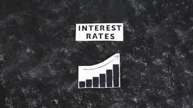 interest rates text and graph showing stats going up, concept of the global economy after the covid-19 pandemic